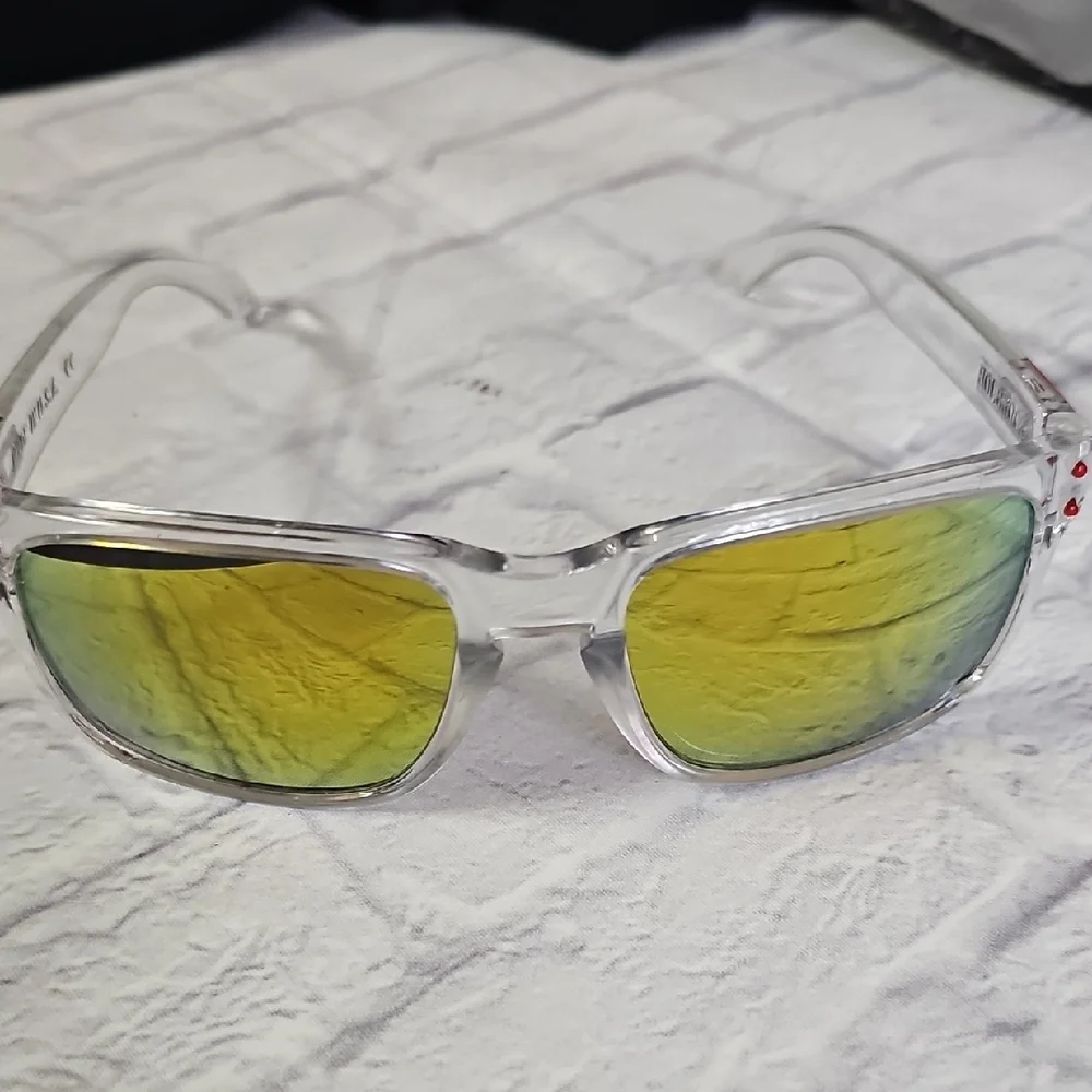 Oakley Holbrooks in a clear / crystal frame with a Prizm-style mirrored lens. - Picture 3 of 6